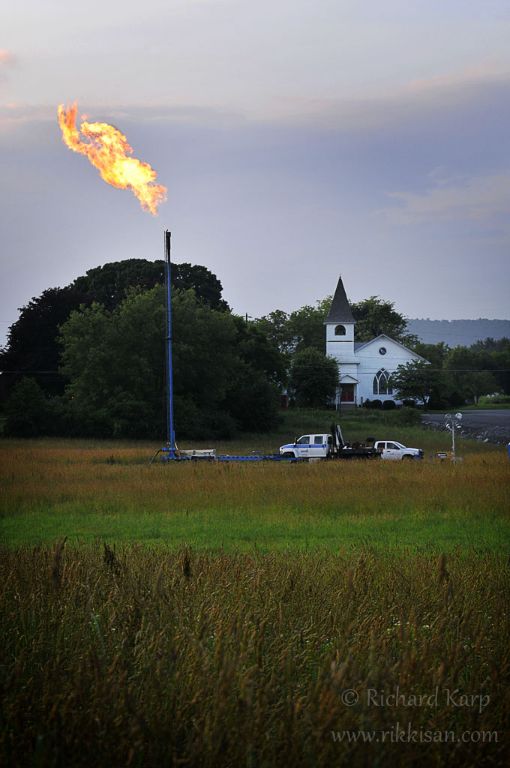 Gas well / flare and church in Farragut