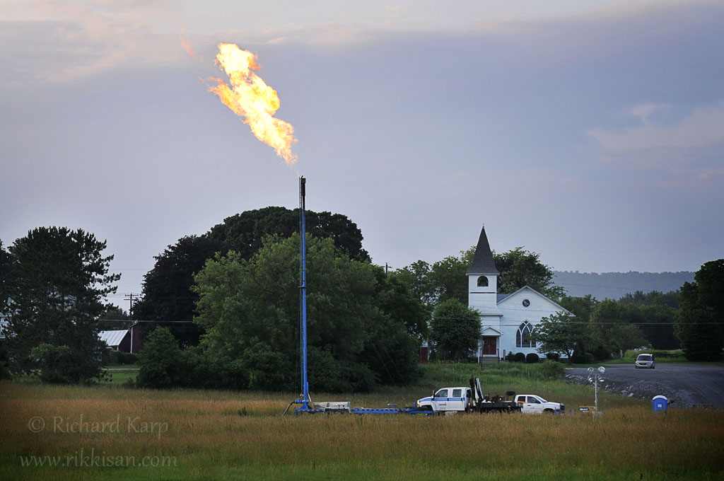 Gas well / flare and church in Farragut