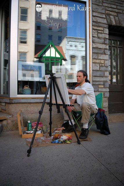 Geoff painting on the street