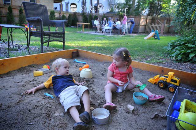 Pence and Tess in the sandbox